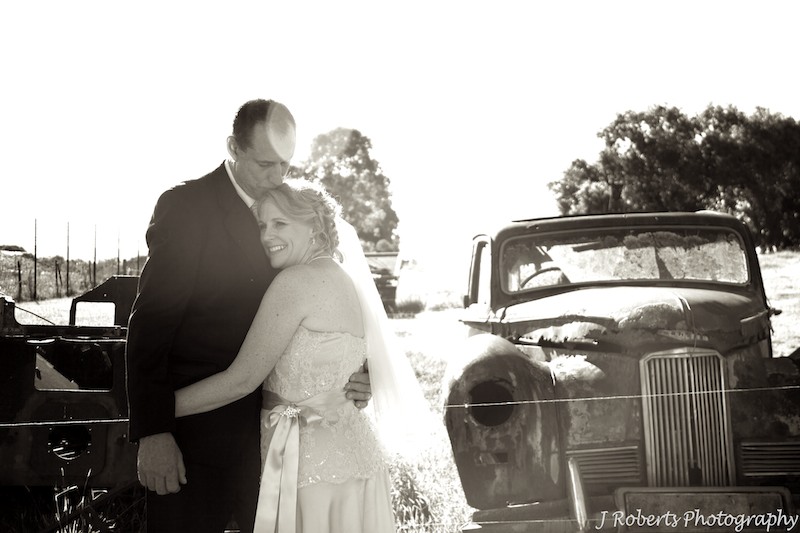 Sepia bride and groom on farm - wedding photography sydney